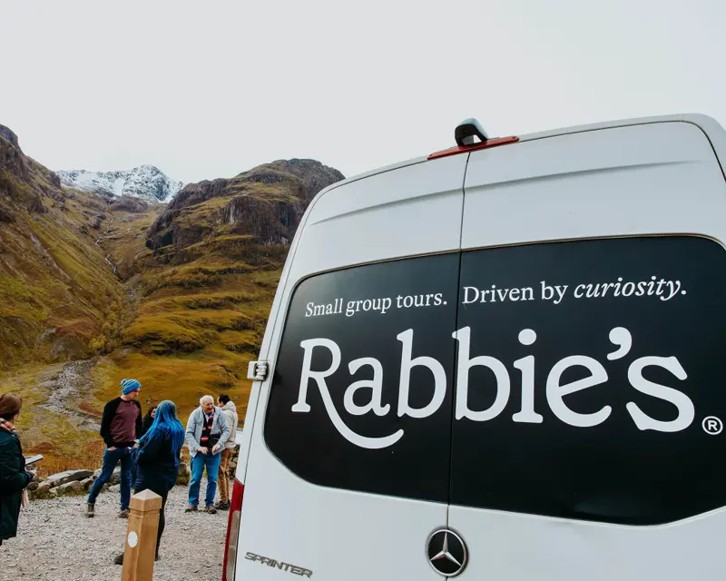 Rabbie's Tour Bus and passengers on Isle of Skye