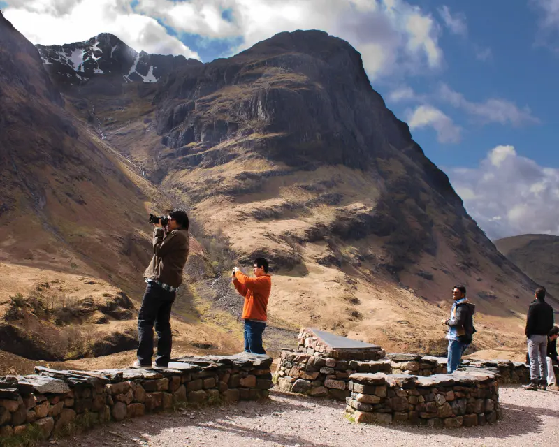People visiting the highlands of Scotland
