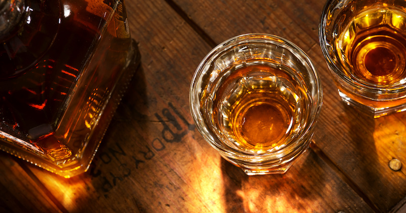 a bird's eye photo of two glasses of whisky 