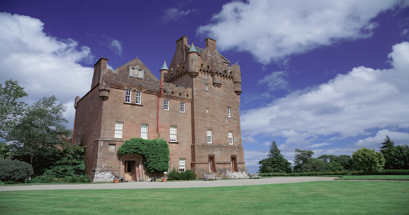 the rose coloured walls and turrets of Brodie Castle make it one of the most iconic castles in Scotland