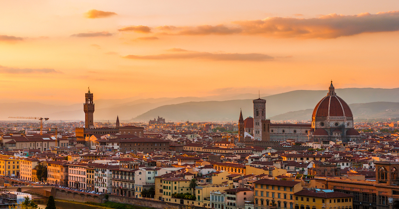 a view of the Florence skyline with the Duomo at sunset