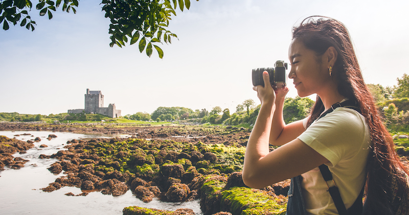 a person taking photos as they solo travel 